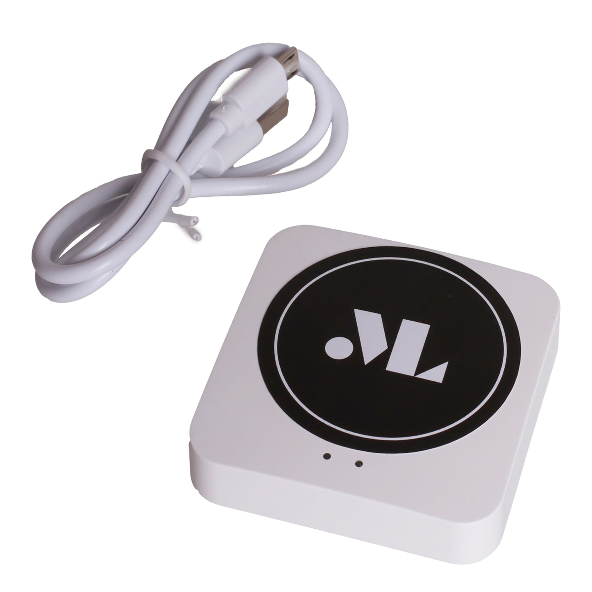 Passerelle Zigbee Tuya blanche posée à plat avec son câble USB enroulé à côté
