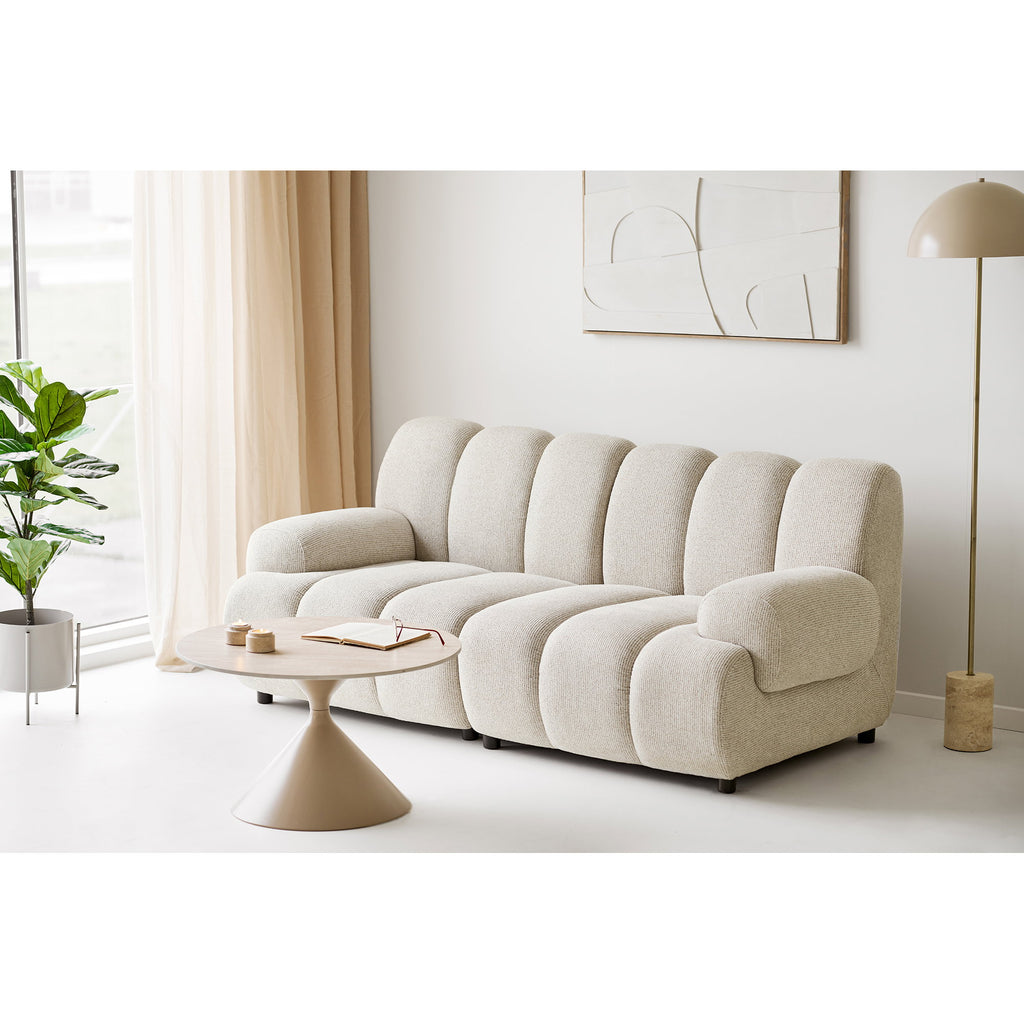 Photophore travertin naturel sur table basse salon canapé bouclette blanc décoration minérale