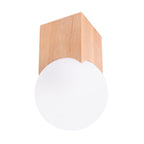 Plafonnier boule Solis bloc de bois naturel échancré et globe de verre opale blanc