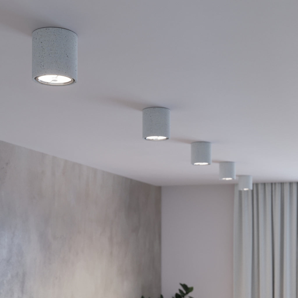 Plafonnier Cullo en béton dans un intérieur industriel