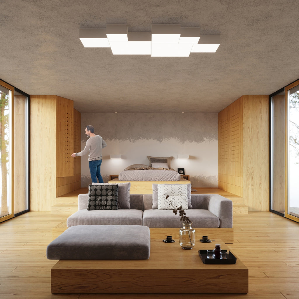 Plafonnier Horus blanc au plafond d'un salon