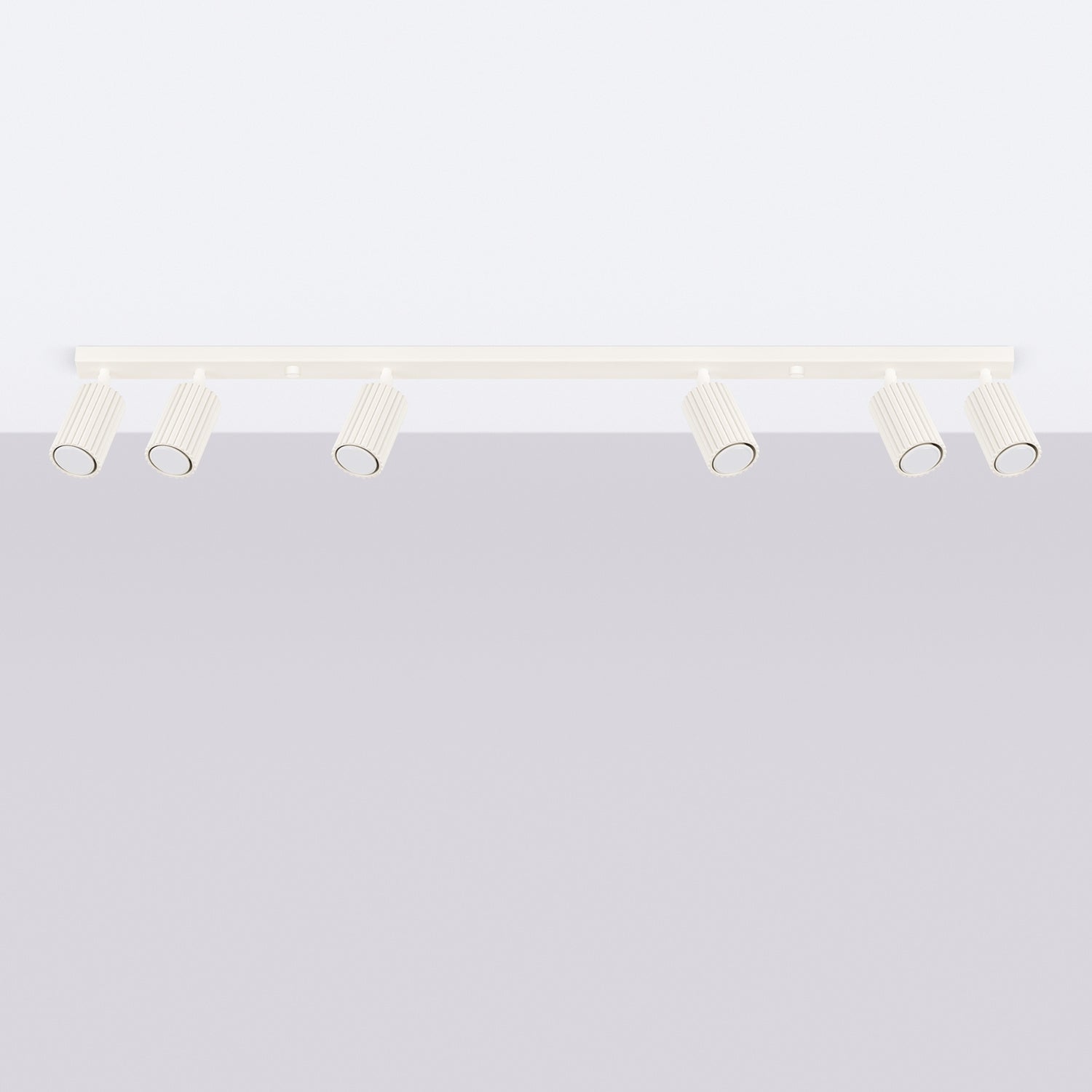 Plafonnier Karbon 6 spots barre beige installé au plafond