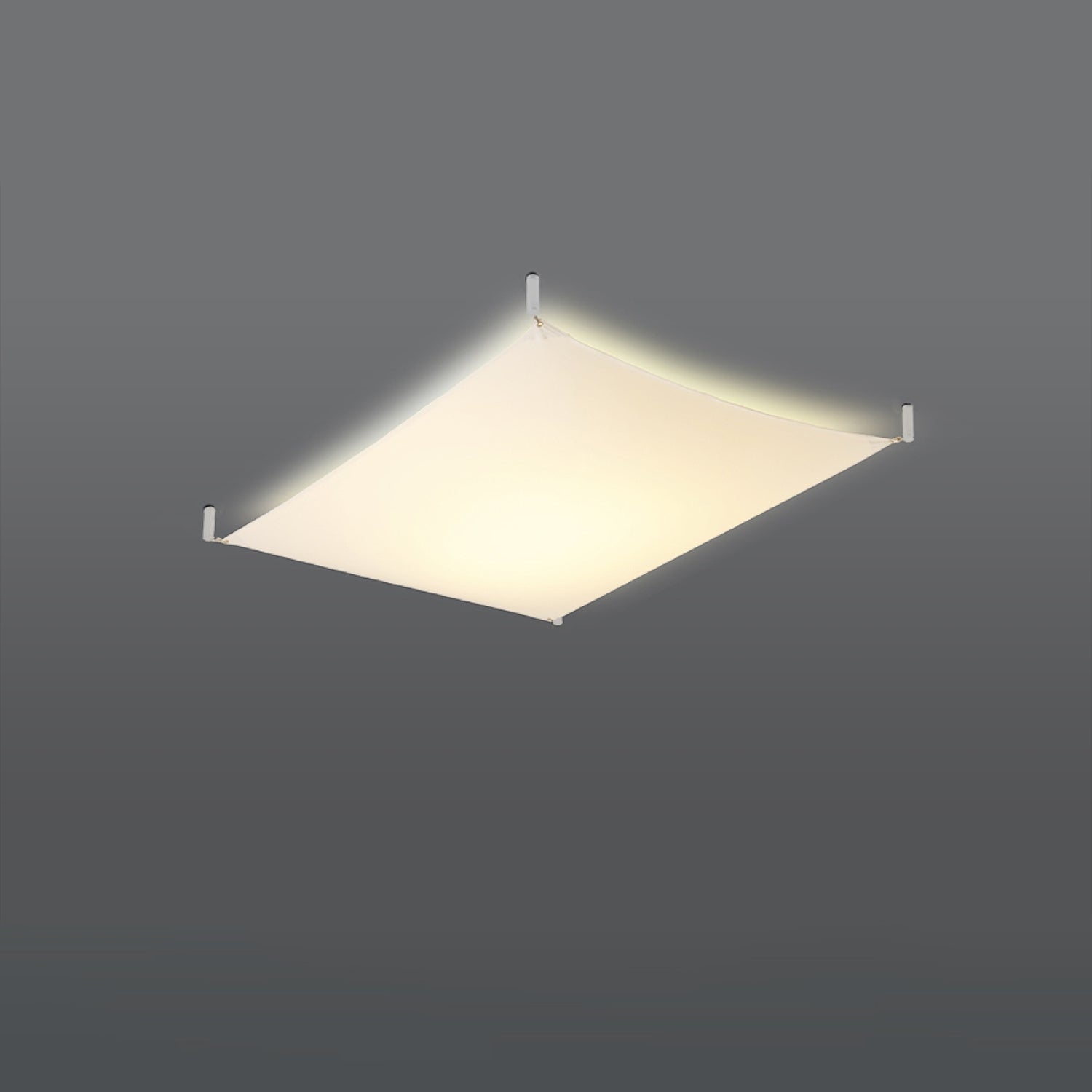 Plafonnier Luna 1 allumé, lumière blanc chaud diffusée par la toile de tissu