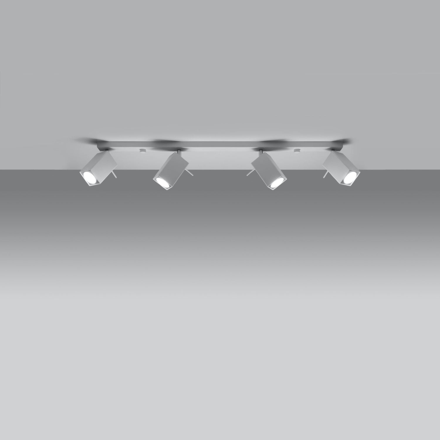Détail des spots à tête carrée du plafonnier Merida rampe 4 spots acier blanc, douille GU10