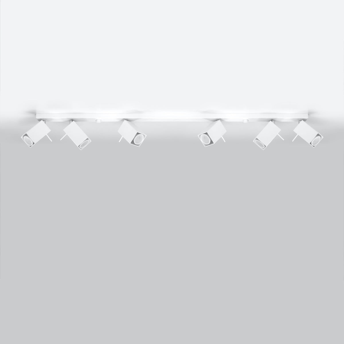 Rampe Merida 6 spots métal blanc fixée au plafond têtes orientées différemment