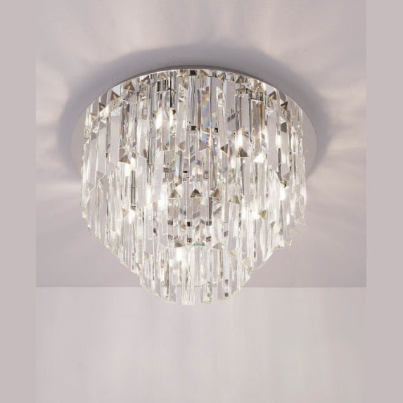 Plafonnier Monaco chromé 42 cm allumé au plafond avec ses reflets de lumière