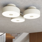 Plafonnier Omiq métal beige E27 en situation dans un intérieur