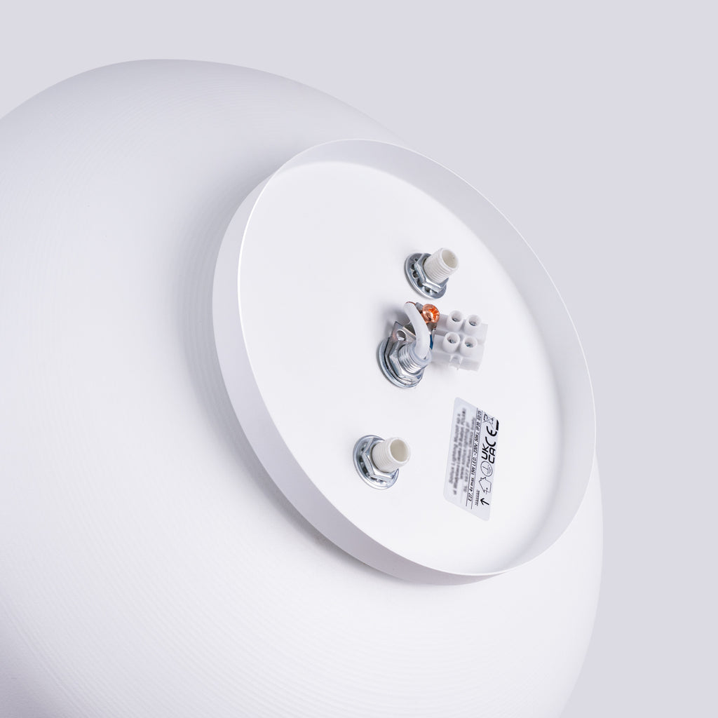 Plafonnier Omiq métal blanc E27 dans un intérieur