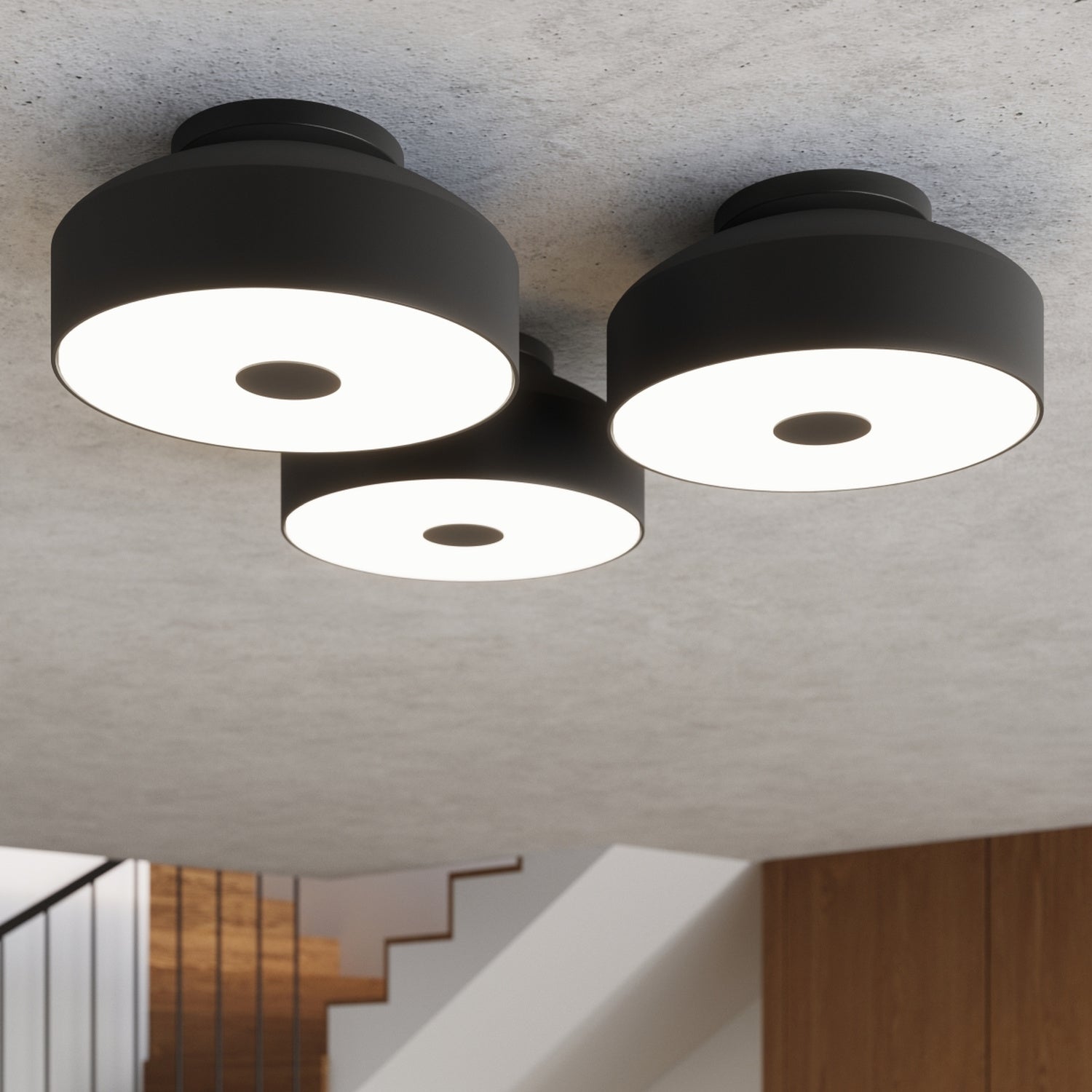 Plafonnier Omiq métal noir E27 en situation dans un intérieur