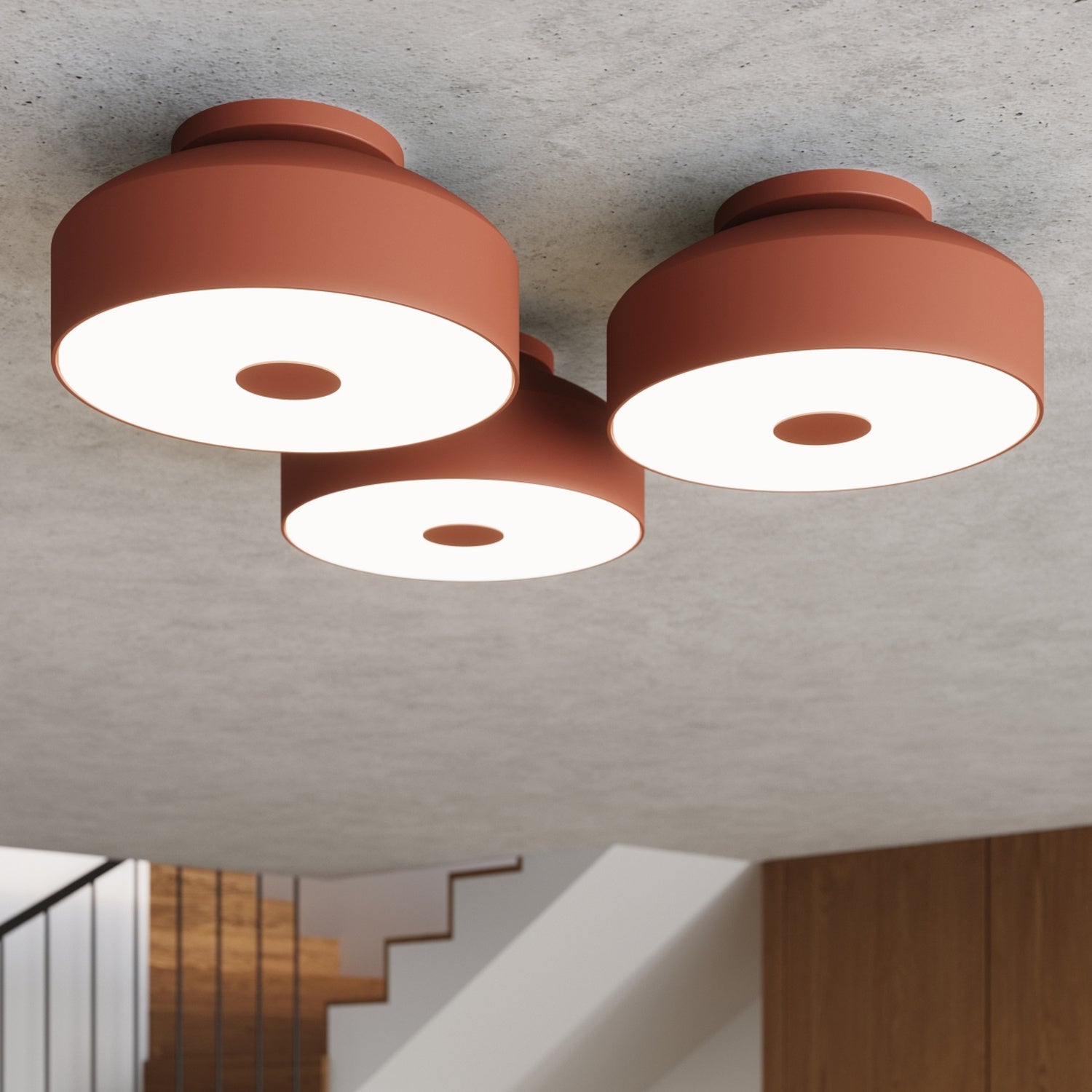 Plafonnier Omiq métal rouge ocre E27 en situation dans un intérieur