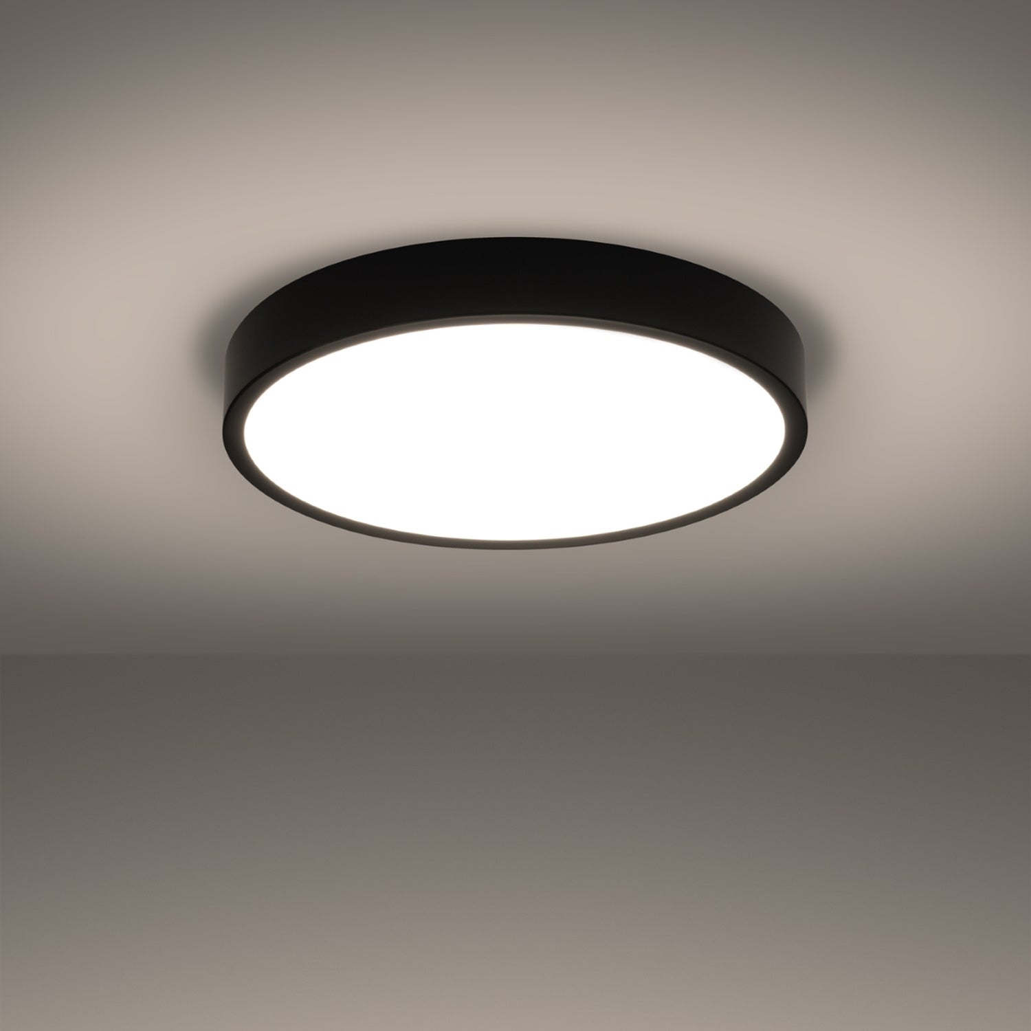 Plafonnier Onyx 50 LED rond aluminium noir allumé, lumière diffuse homogène