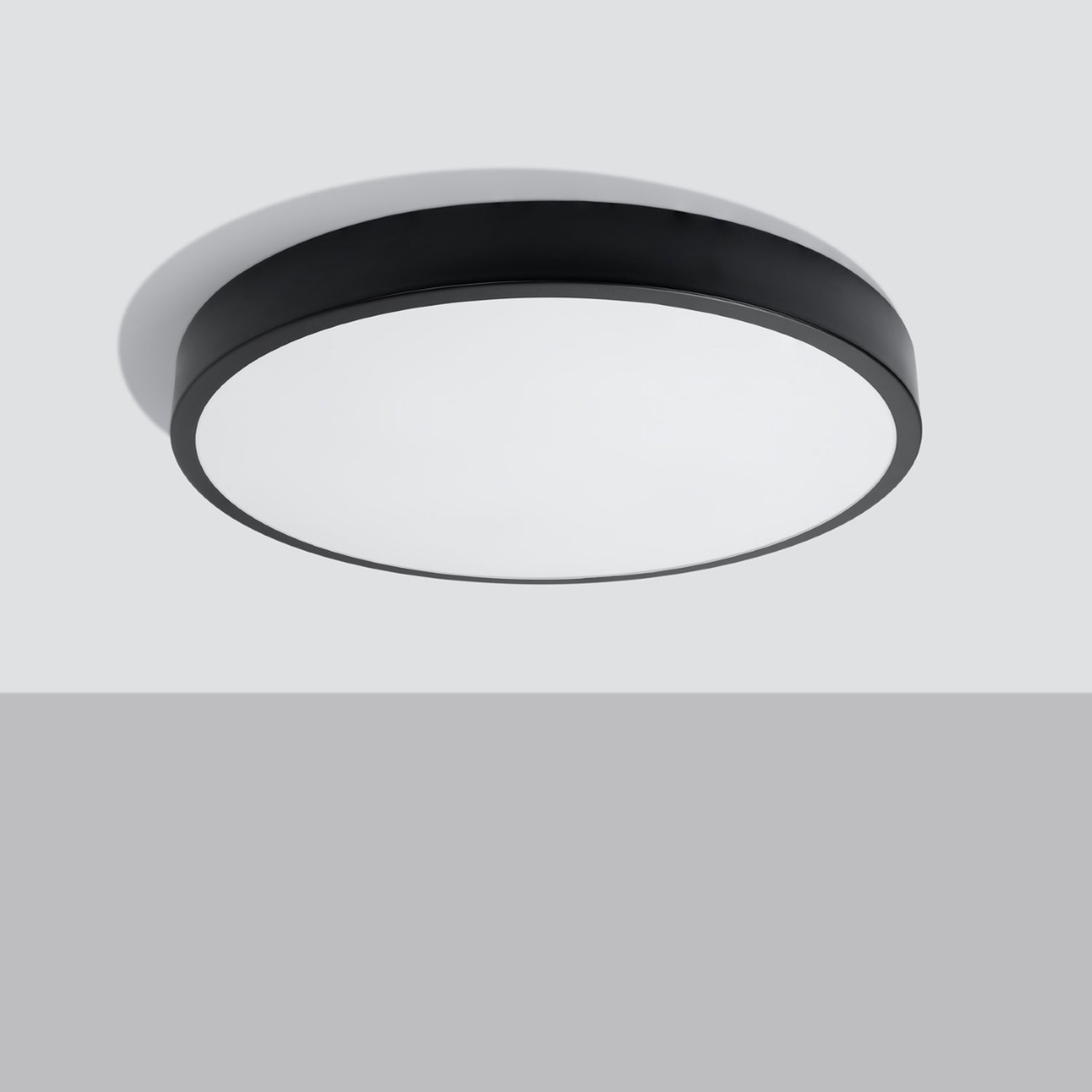Plafonnier Onyx 60 LED rond aluminium noir de profil, 6 cm d'épaisseur