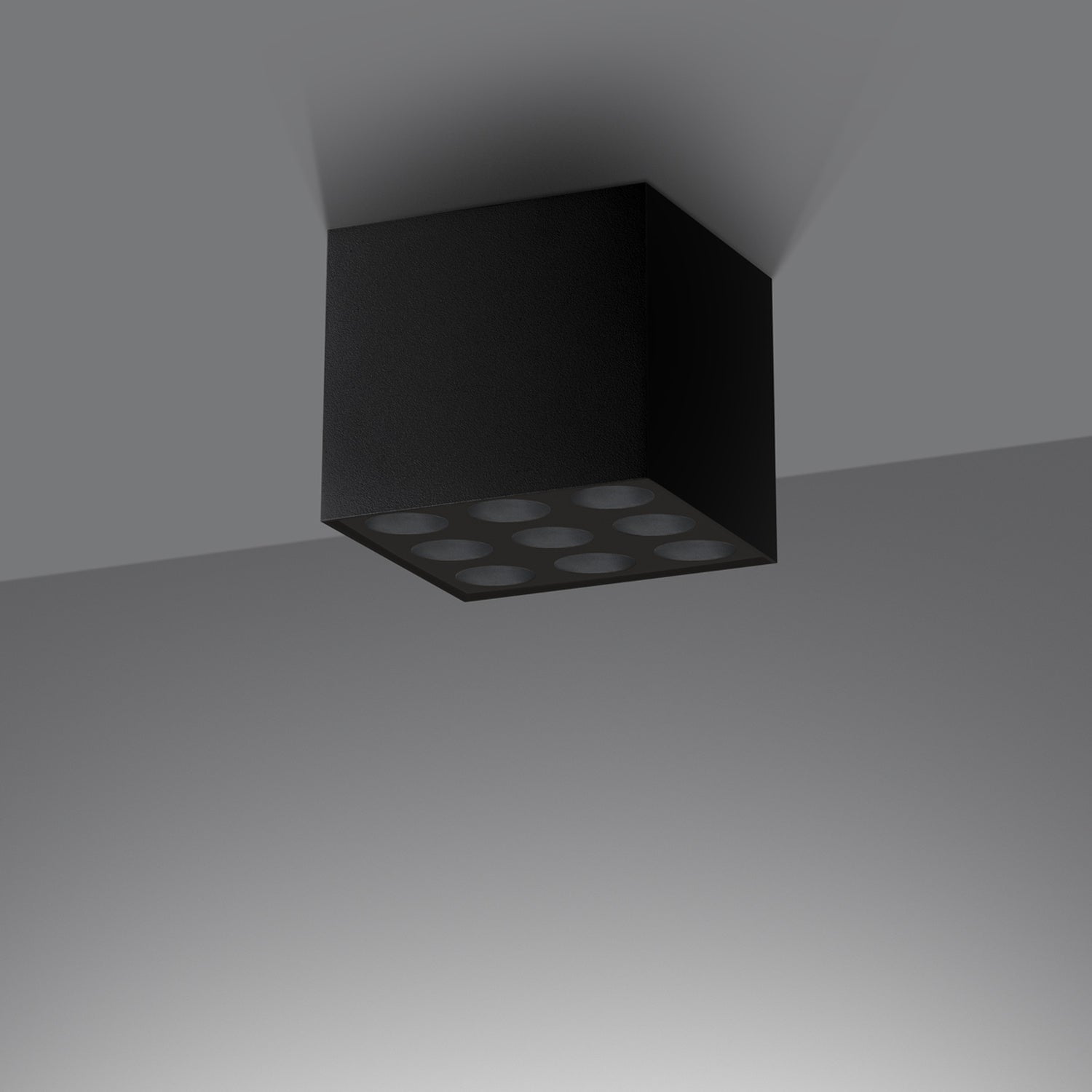 Plafonnier Ozzy LED carré aluminium noir installé au plafond