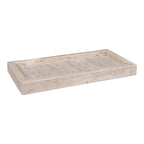 Plateau décoratif rectangulaire en travertin naturel vu de trois quarts avec son rebord droit sur fond blanc
