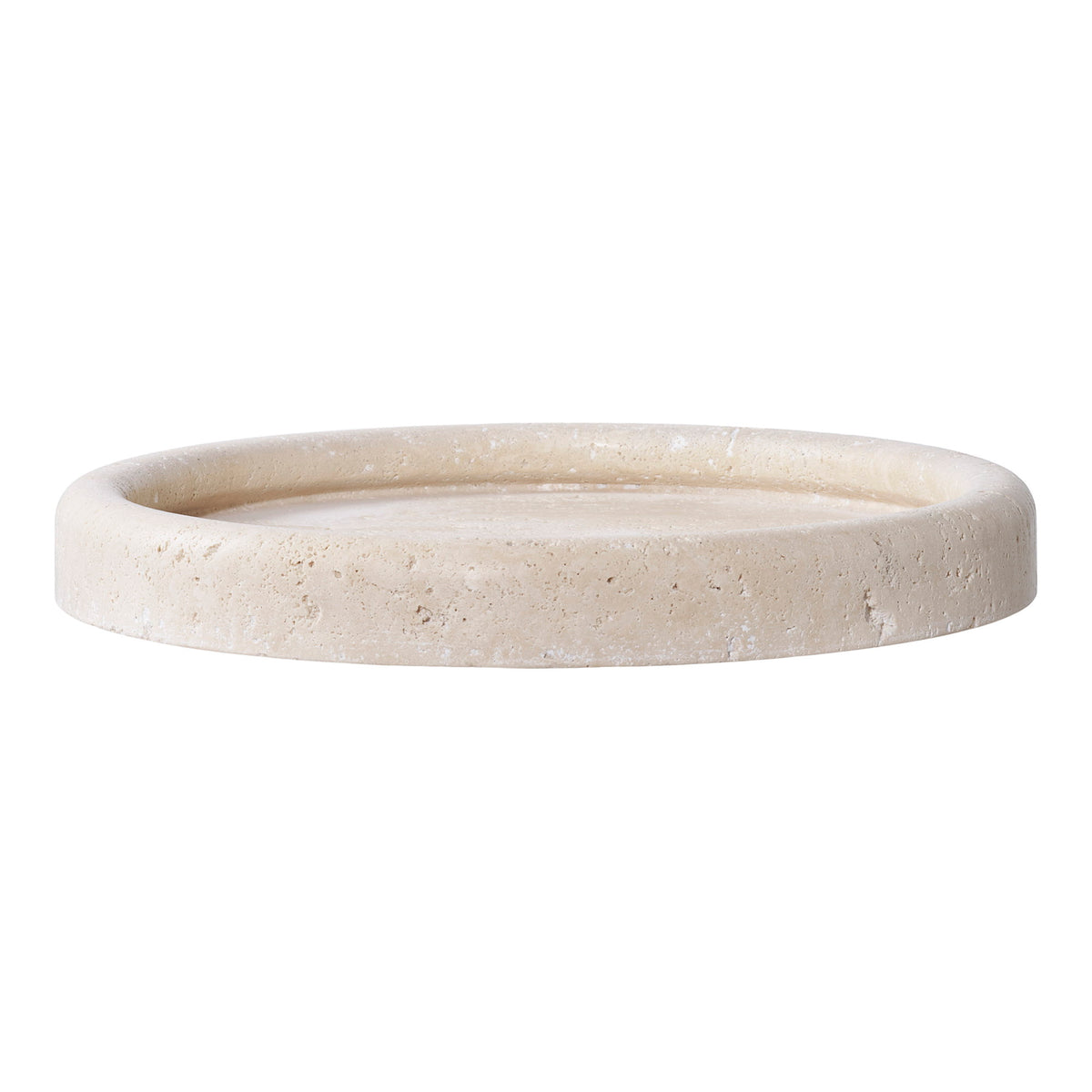 Plateau rond en travertin naturel beige vu de profil avec son bord relevé en bourrelet