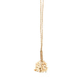 Pompon décoratif Vanilla en petits cauris crème 65 cm