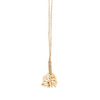 Pompon décoratif Vanilla en petits cauris crème 65 cm