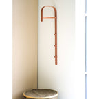 Portant Gresto mural métal terracotta arche 80 cm en situation