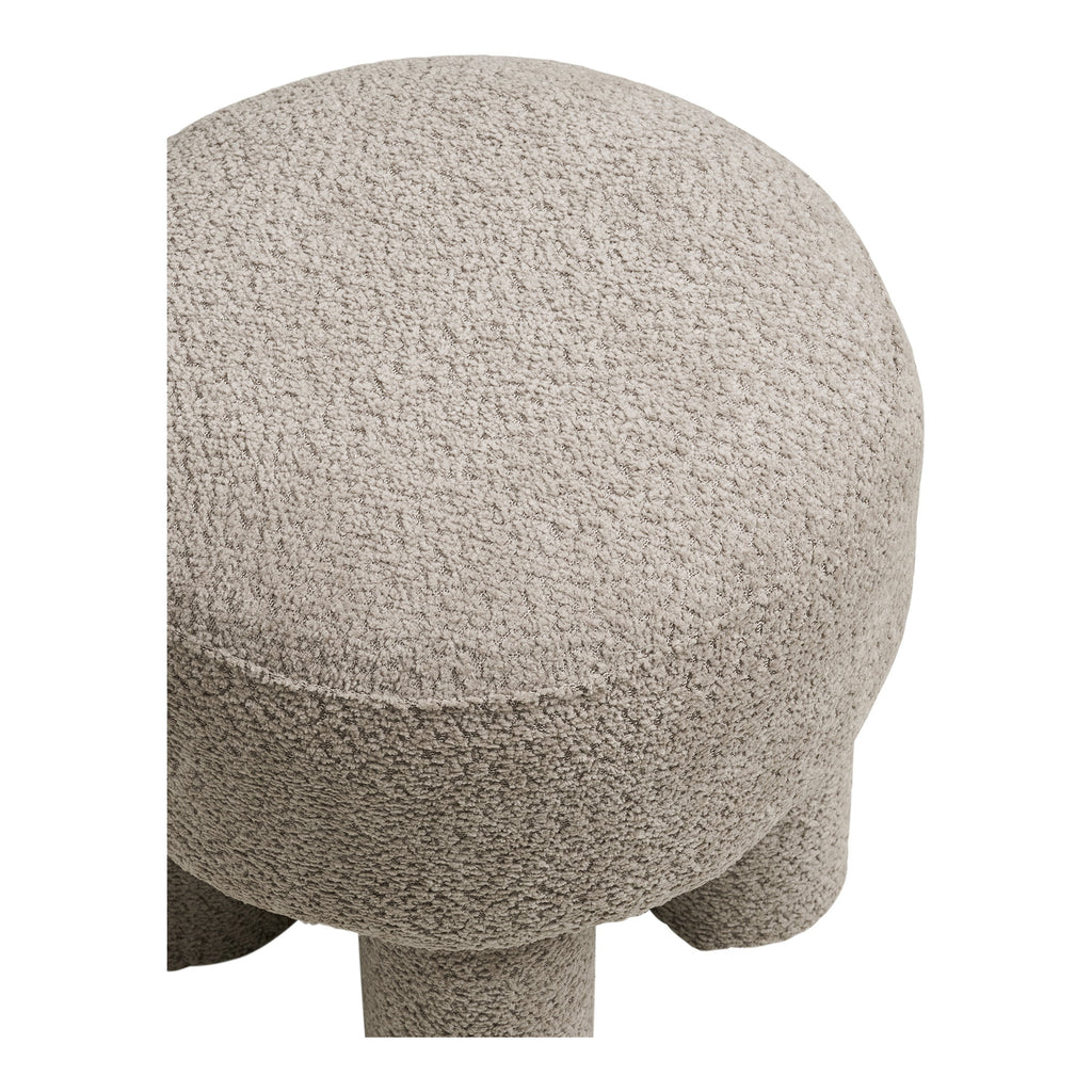 Détail texture bouclée assise ronde pouf Canberra sable foncé gros plan
