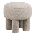 Pouf Canberra bouclé sable foncé assise bombée vue trois quarts