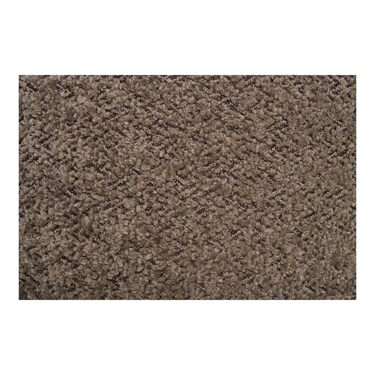 Gros plan sur le bouclé brun du pouf Medas