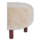 Détail pieds cylindriques brun foncé fausse fourrure longue beige pouf Inverness