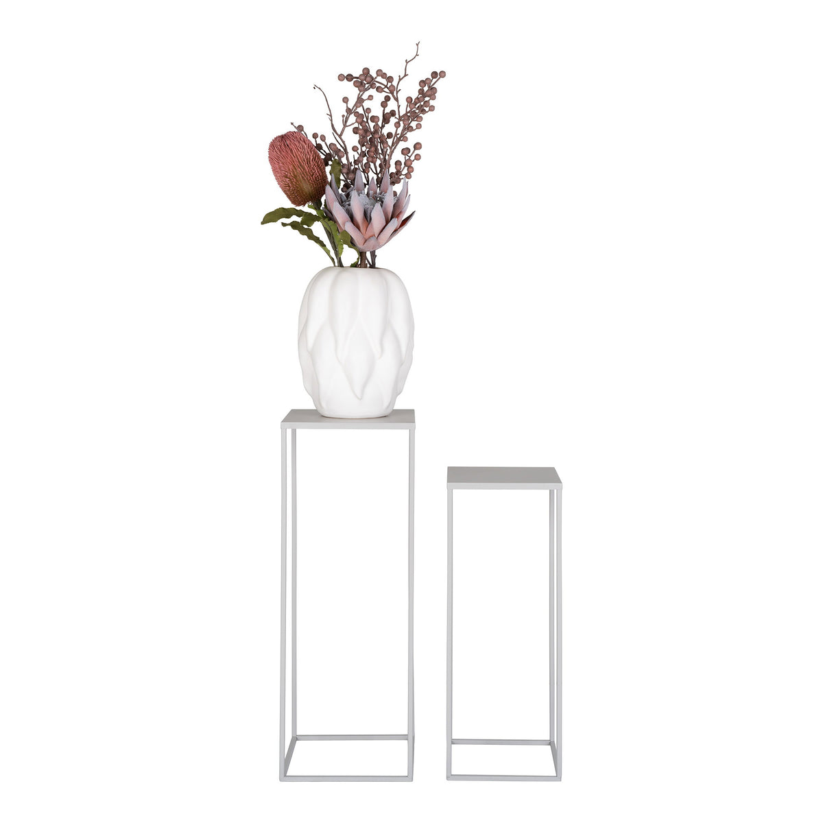 Sellettes Beja gris clair vues de face avec un vase blanc sculpté garni d'un bouquet sur la grande