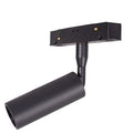 Spot sur rail Magnetic noir à réflecteur incliné sous son adaptateur à contacts