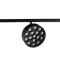 Spot Micro11 rond noir sur son rail tête tournée de face avec ses seize LED en alvéoles
