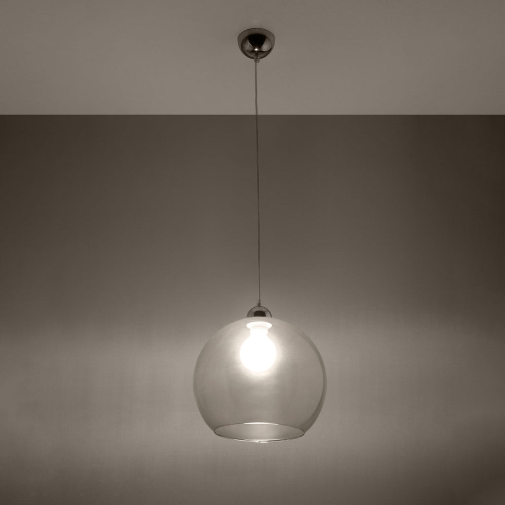 Suspension Ball transparente en verre allumée