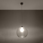 Suspension Ball transparente en verre allumée