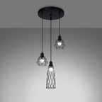 Suspension Suba 3 en grappe allumée avec ses trois ampoules visibles dans les cages noires
