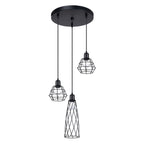 Suspension Suba 3 en grappe trois cages en fil d'acier noir sous une rosace ronde sur fond blanc