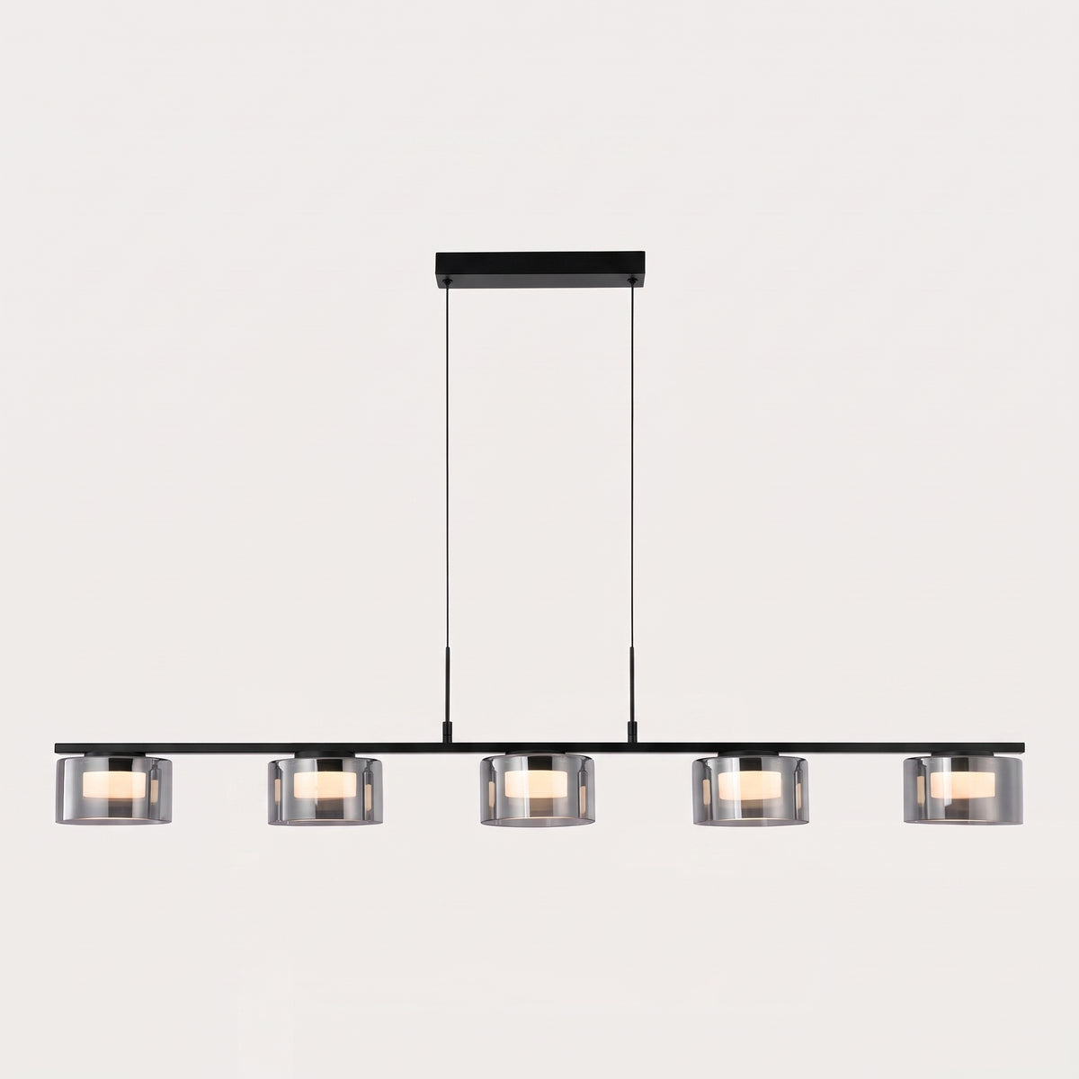 Suspension Cholet rampe LED allumée, cinq cylindres en verre fumé sur fond clair