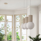 Suspension Halo 3 boules opale barre beige en ambiance
