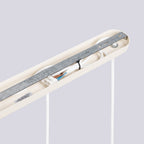 Suspension Halo 3 boules opale barre beige en ambiance