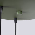 Suspension Halo 3 boules opale grappe vert olive dans un intérieur