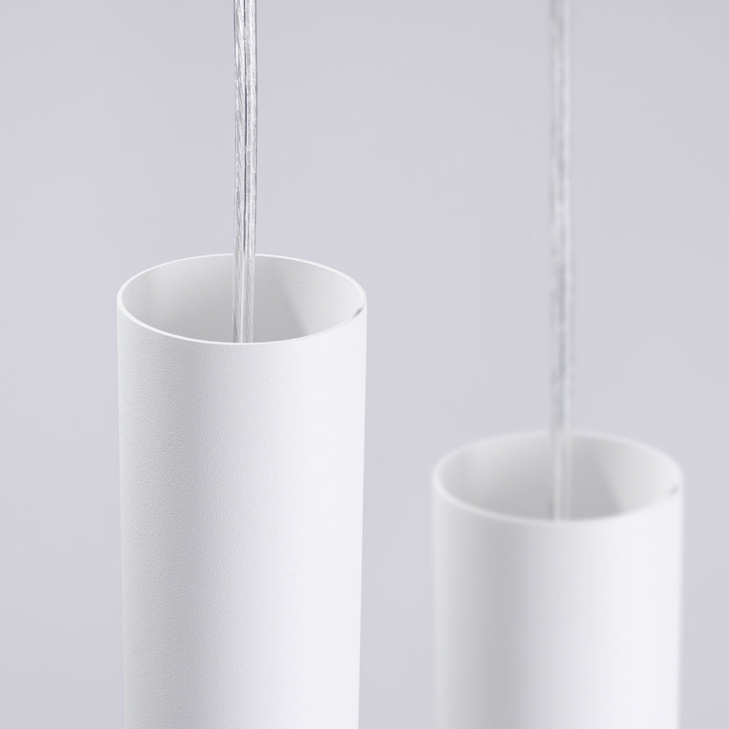 Suspension Lami 3 tubes ajourés en grappe acier blanc GU10 en ambiance