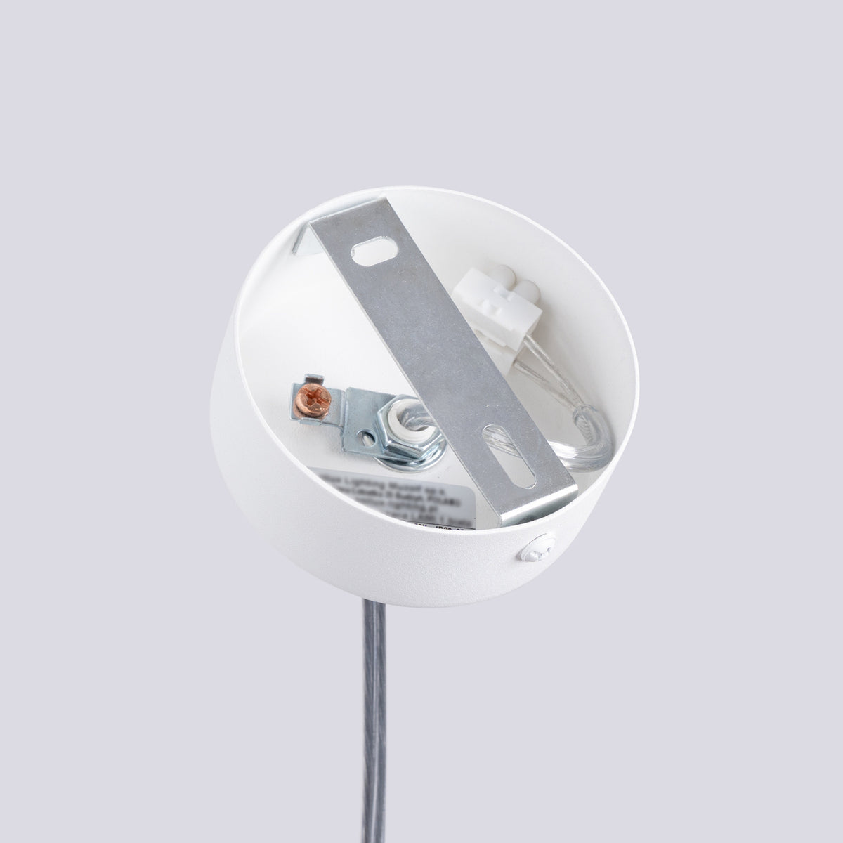 Intérieur de la rosace de la suspension Lami avec étrier de fixation bornier et borne de terre