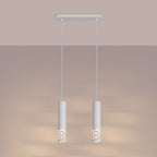 Suspension Liro 2 allumée avec la lumière qui filtre par les ovales ajourés des deux tubes