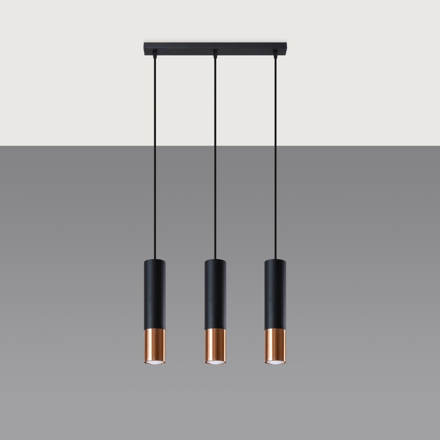 Suspension Loopez 3 en ligne acier noir et cuivre, détail de l'embout cuivré brillant