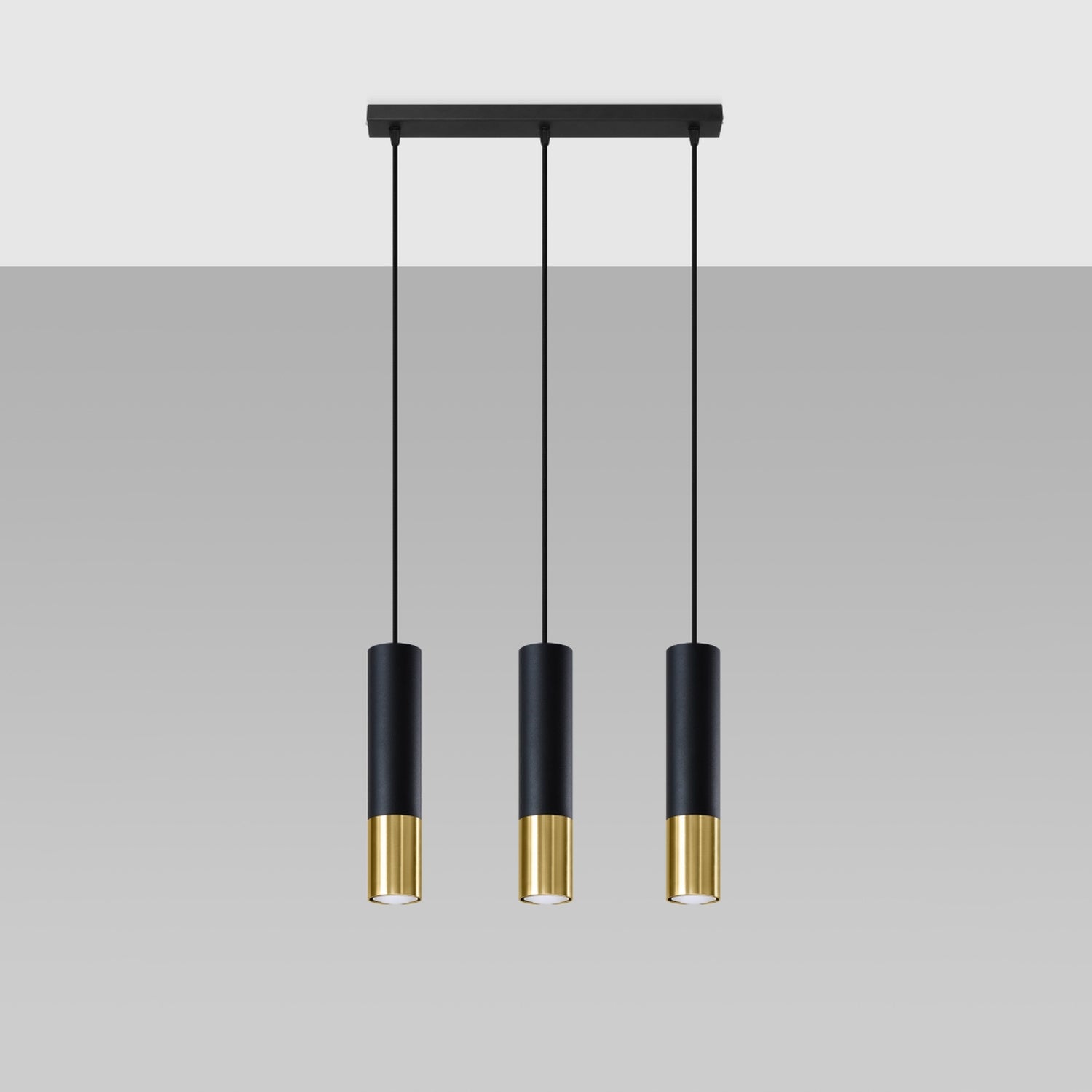 Suspension Loopez 3 en ligne acier noir et doré, détail de l'embout doré brillant