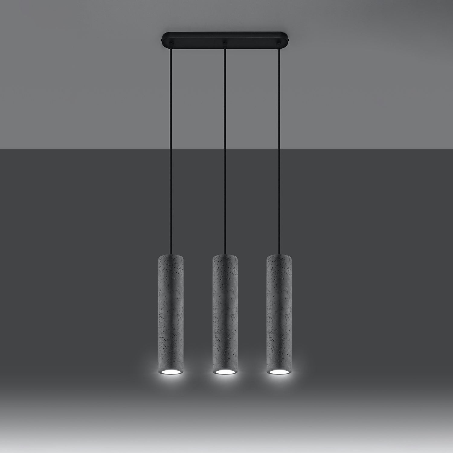 Suspension Luvo 3 en béton gris, trois tubes allumée, faisceau GU10 dirigé vers le bas
