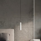 Suspension Luvo 3 en béton gris, trois tubes dans un intérieur industriel
