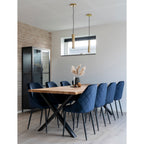 Duo suspensions Paris laiton doré au-dessus grande table manger, chaises velours bleu marine