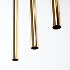 Suspension Pastelo 3 en ligne tubes fins doré poli G9, détail du tube fin