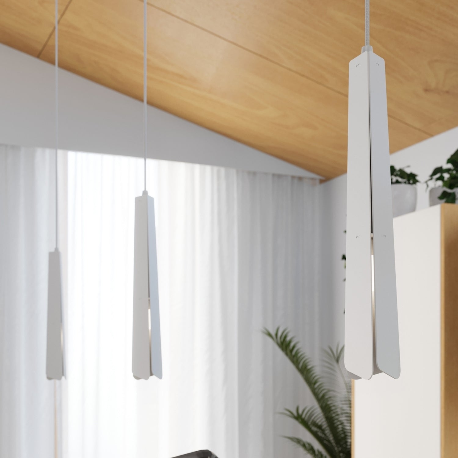 Suspension Prysm 3 en grappe métal blanc G9 en situation dans un intérieur