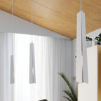 Suspension Prysm 3 en ligne métal blanc G9 en situation dans un intérieur