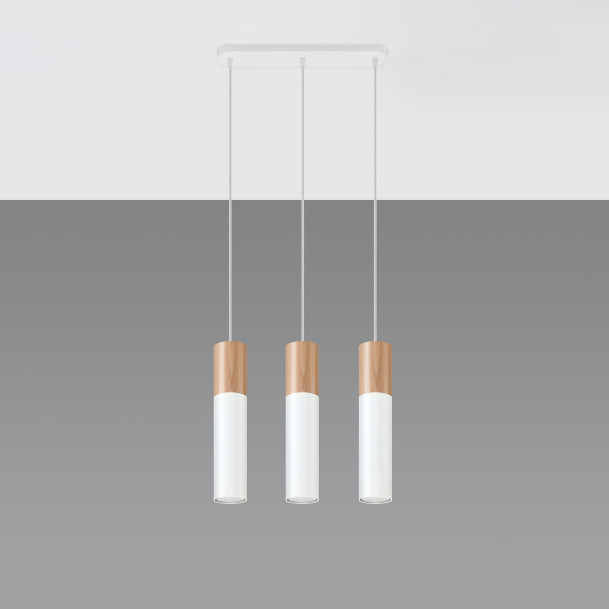 Suspension Pablo 3 lumières métal blanc et bois sous sa barre de plafond oblongue