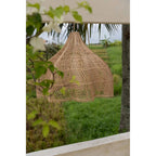 Abat-jour de suspension Whipped en rotin naturel 60 cm en situation
